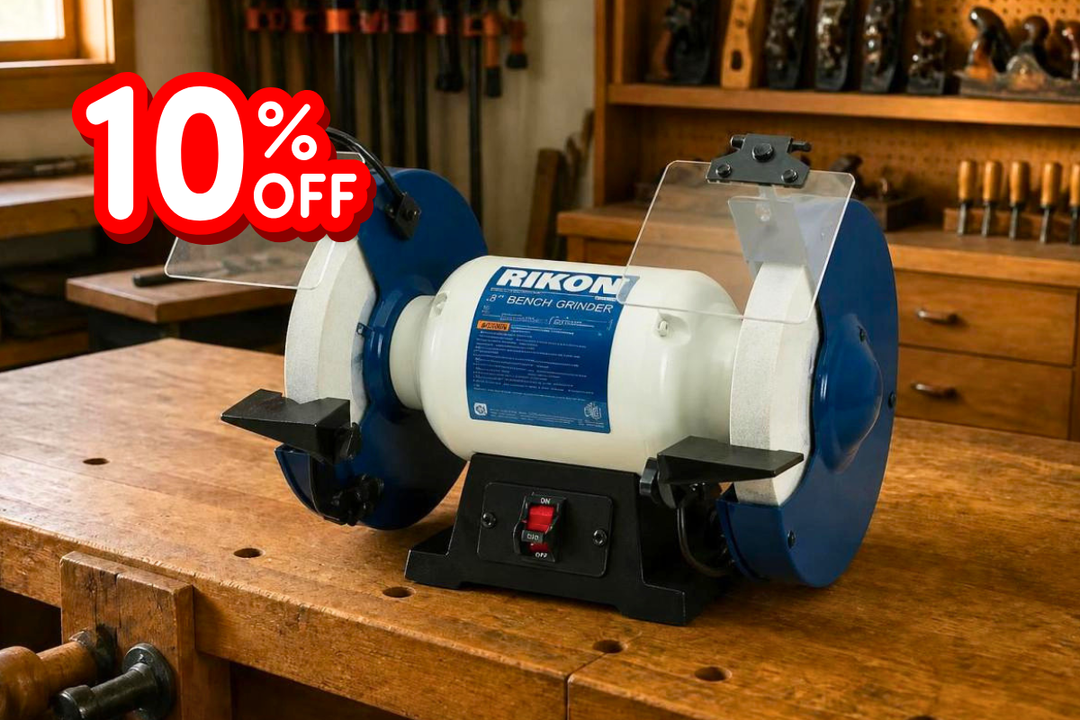 Rikon bench grinder on a wooden workbench with a 10% off label.