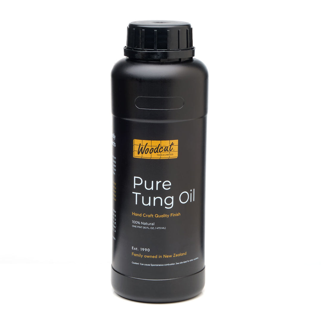 Black bottle of Woodcut Pure Tung Oil on a white background
